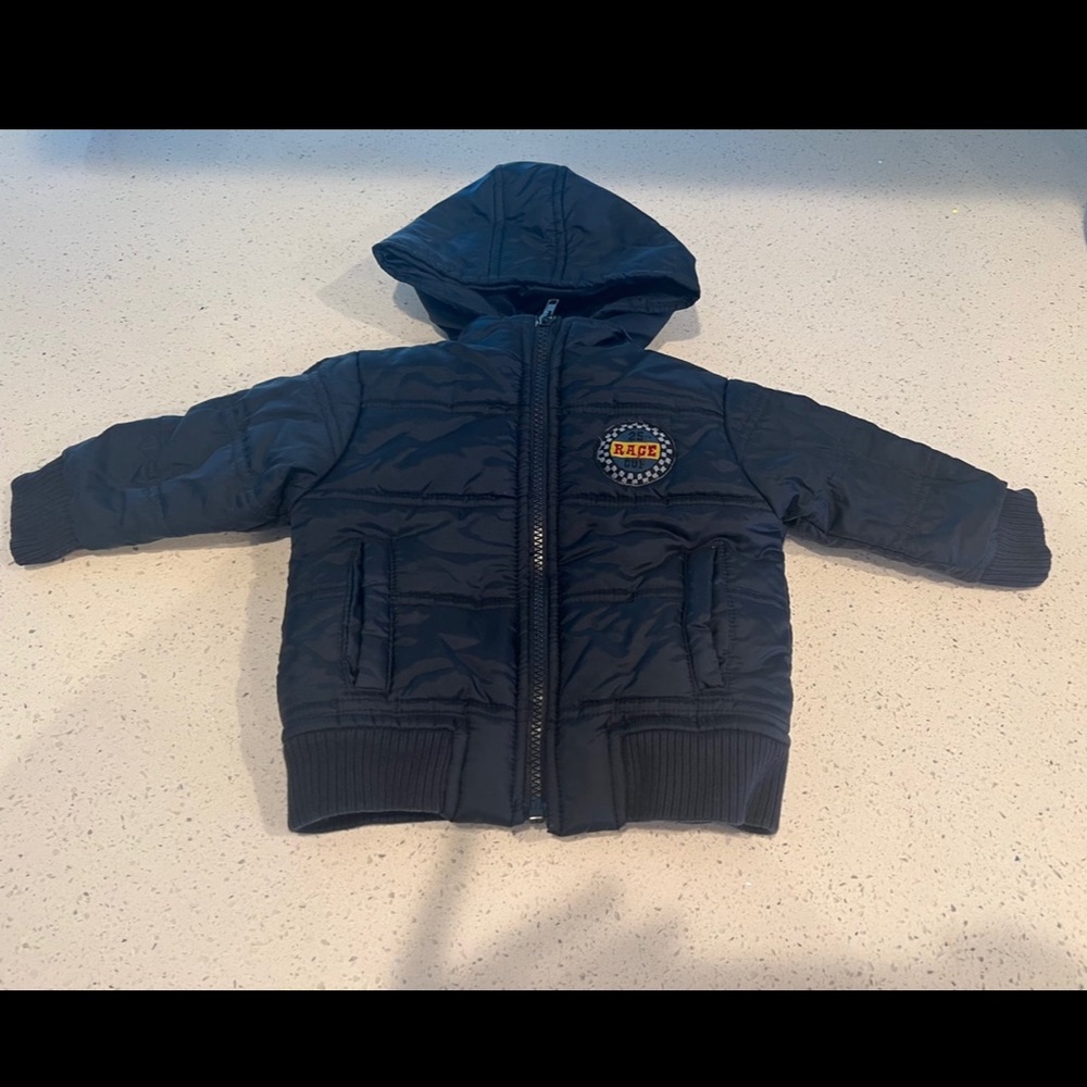 12 month zip up rain jacket 
With side pockets and hood
kids Headquarters